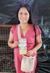 CASH ASSISTANCE. Gina Tambal, a farmer from Barangay San Juan in Sibalom, shows her intervention monitoring card with PHP5,000 funds, on Friday (May 31, 2024). Tambal said she would use the money to buy fertilizer and insecticide needed by her rice farm. (PNA photo by Annabel Consuelo J. Petinglay)